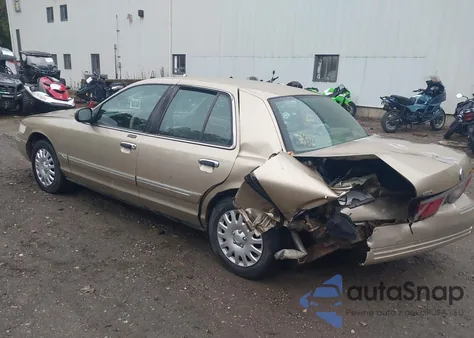 2000 Mercury Grand Marquis Gs z USA, uszkodzony, nr VIN 2MEFM74W5YX717222